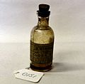 Bottle of clock oil - Glass bottle of oil for clock. Inscription - J D…