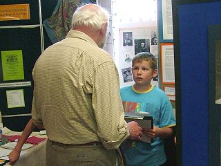 Boy talking to veteran