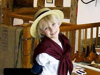 Child in costume with resource box